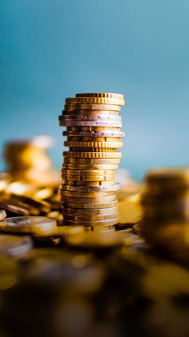 Gold, silver futures drop as traders book profits ahead of Fed policy outcome