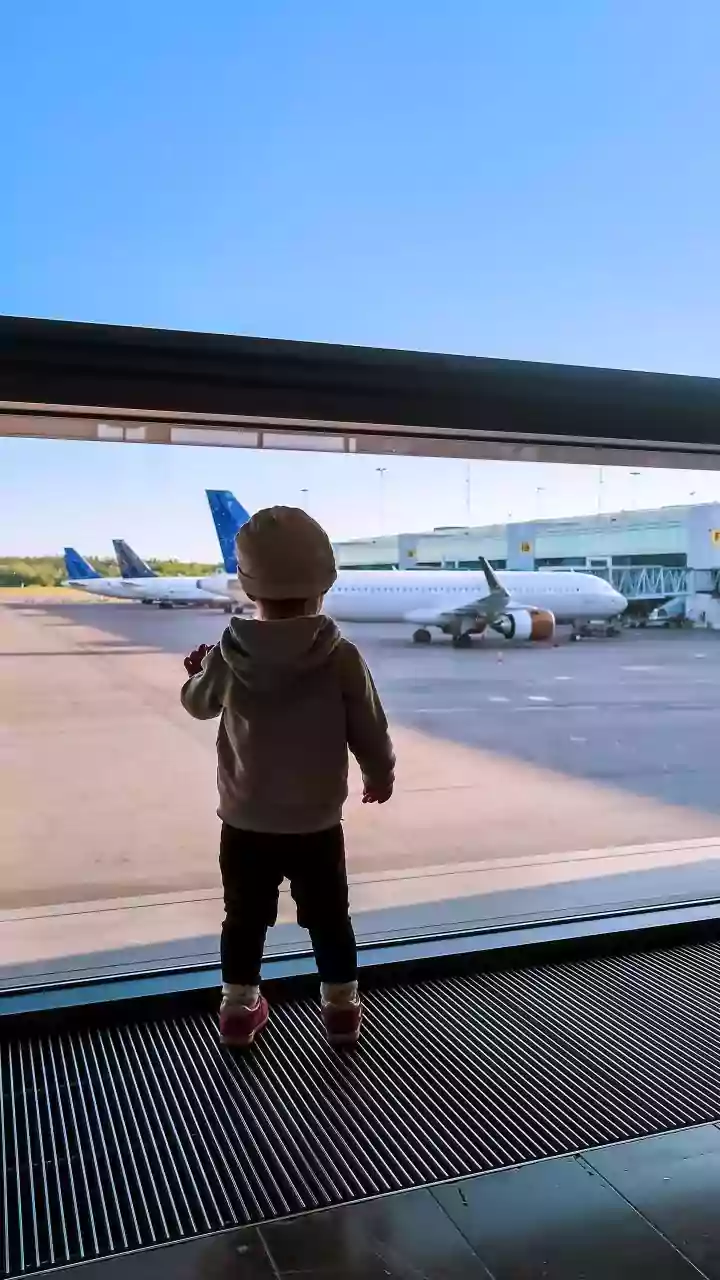The Subtle Art of Parenting: A Child's Gentle Car Door Gesture Speaks Volumes