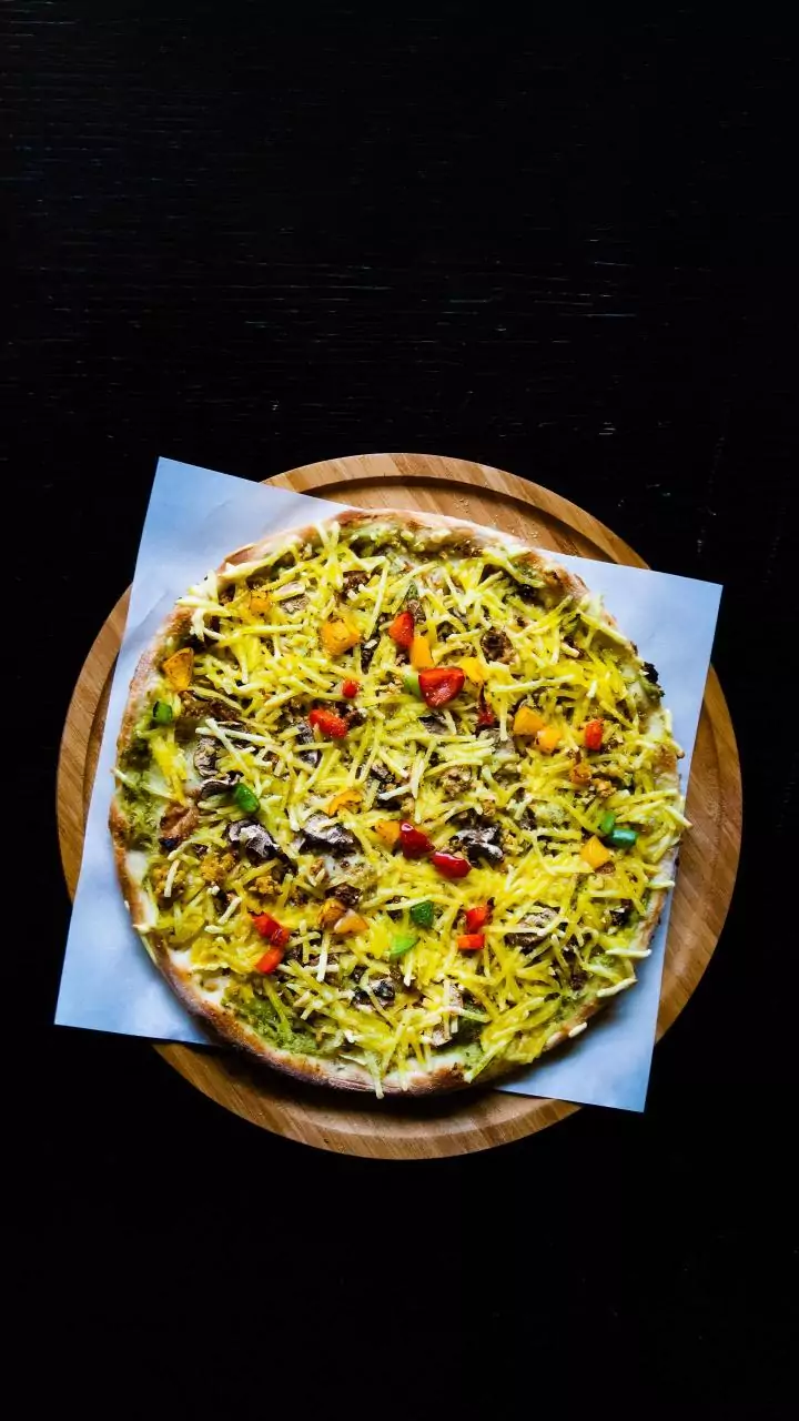 Noida pizza shop owner arrested after video shows him spitting on dough: Police
