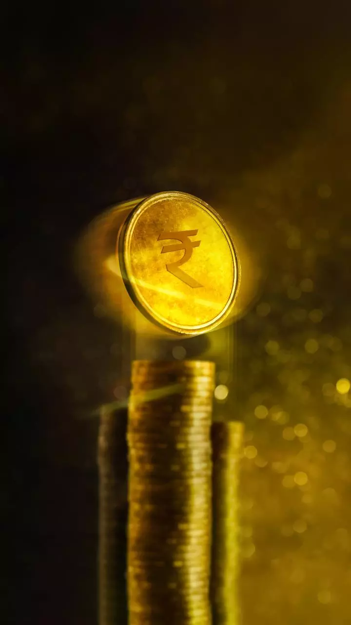 Rupee rises 10 paise to settle at 87.78 against US dollar