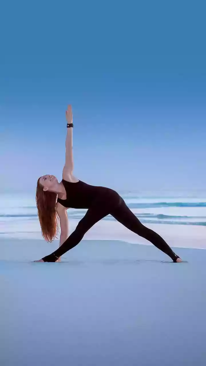 Practice Extended Triangle Pose To Stretch Your Stiff Side Body