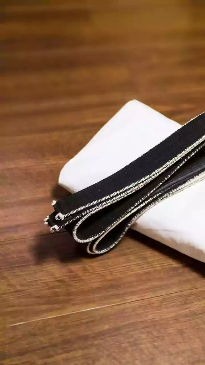 Ditch Bulky Pockets: The Rise of the Chic Men's Pouch, Championed by Style Icons