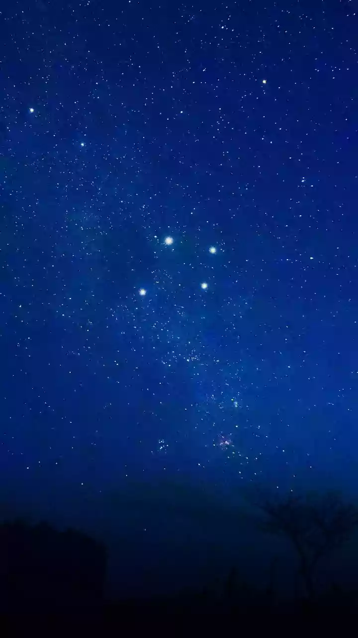 Por que a constelação Cruzeiro do Sul está invertida na bandeira do Brasil?
