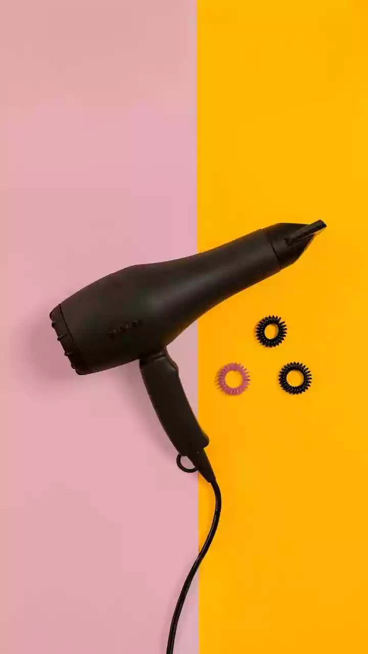 Get bouncy spiral curls at home with these easy tips