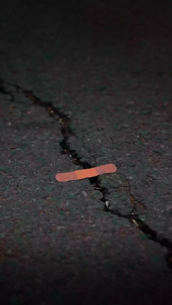 Bio engineered binders in self healing asphalt protect city streets from monsoon damage
