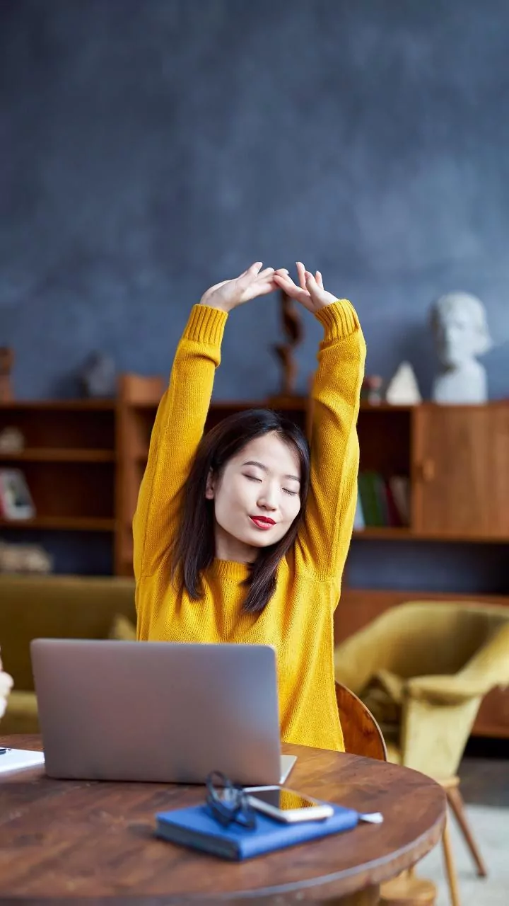Beat Lower Back Tightness With Mindful Afternoon Desk Yoga Stretches