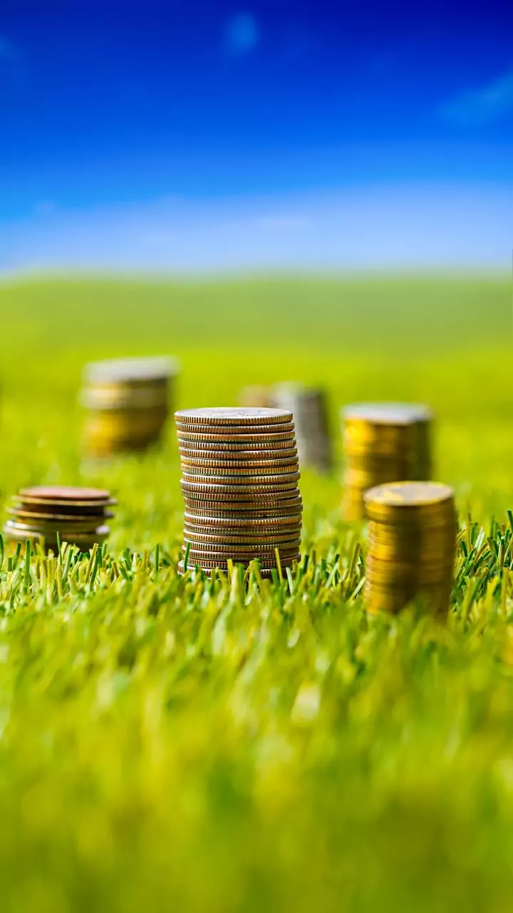 Gold gains, silver drop as traders await Fed policy outcome