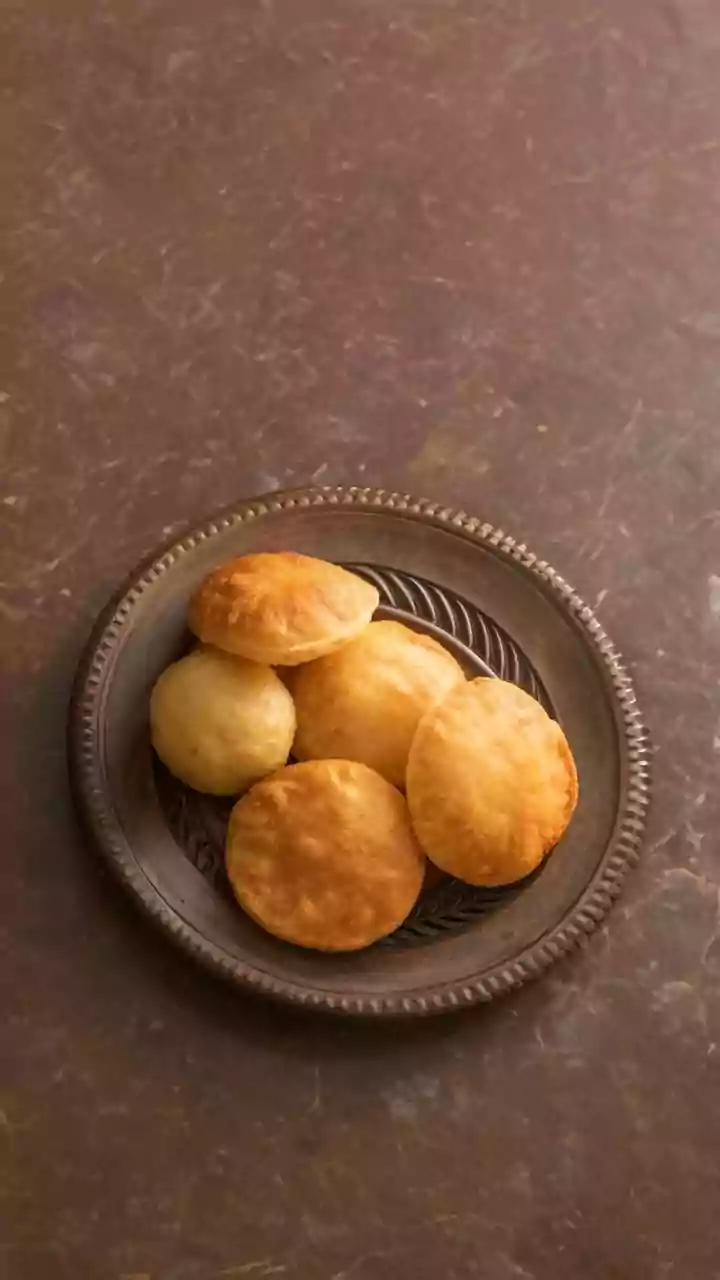 A Light Film Of Oil Can Replace Excess Flour During Poori Rolling