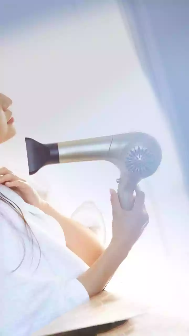 How To Dry Wet Hair Without Excessive Heat Or Rough Towel Rubbing