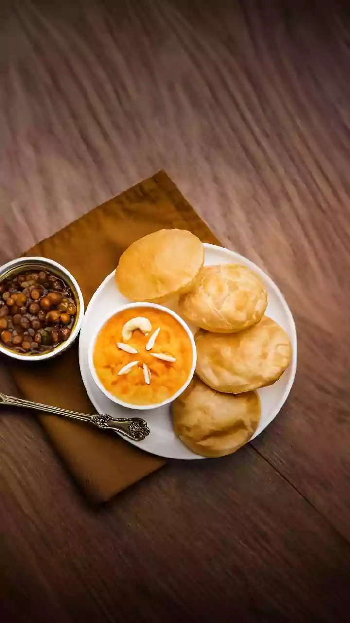Air India’s 'Halwa-Puri-Chana' Meal On Delhi-Bali Flight Leaves Internet Amused; Passenger Says, 'First In My Bloodline To Get This Desi Luxury'