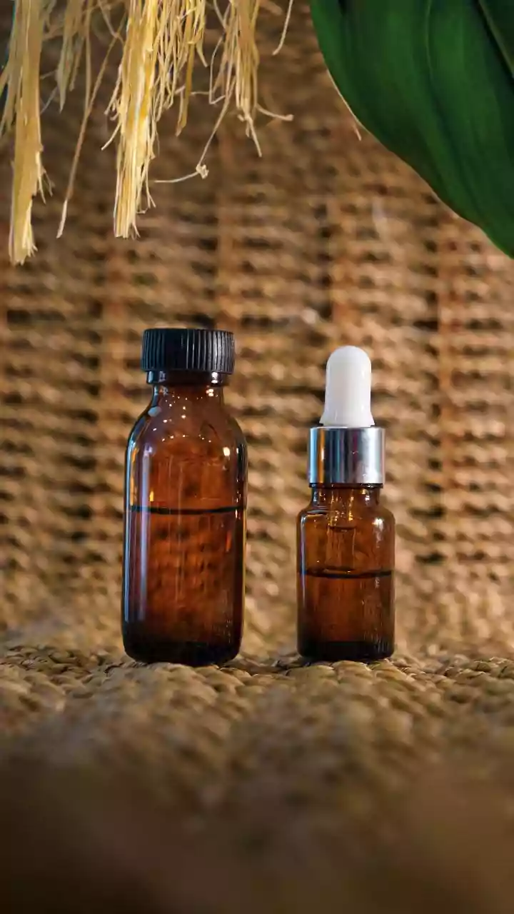 Recycled Tinted Apothecary Bottles Form Gorgeous Desktop Botanical Displays