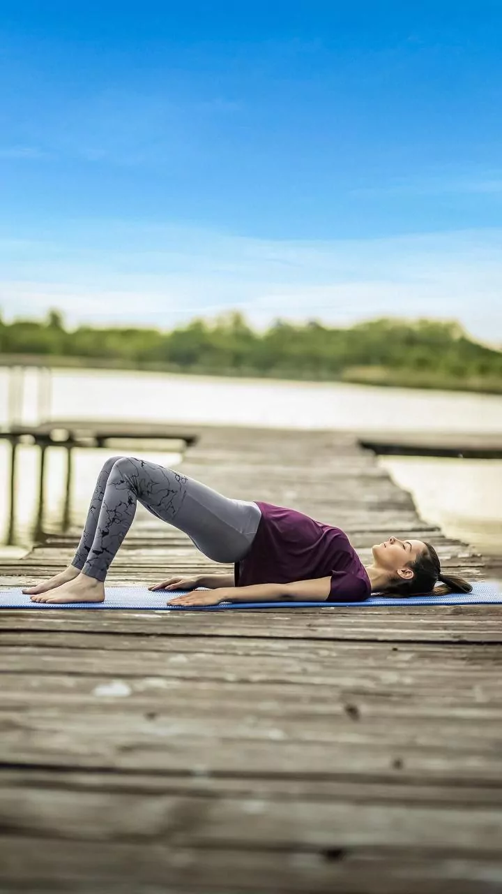 Why Morning Practice Sets A Positive Tone While Evening Yoga Relieves Back Strain