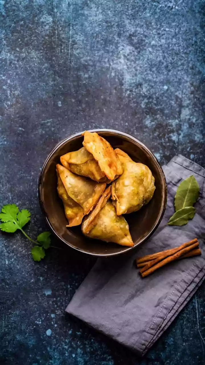 Air Fried Indian Snacks Enjoying Samosas And Banana Chips With Less Oil