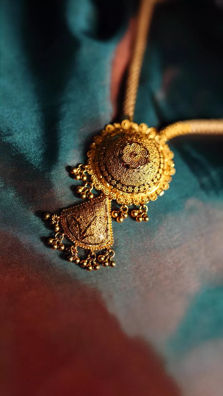 Gold prices cool off after record high, but the buzz isn't over