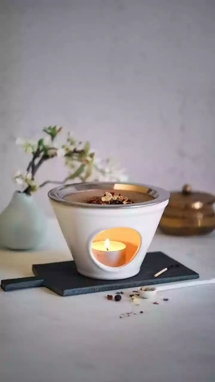 Making Scented Candles At Home Uses Fragrance Oils To Add Aroma To Melted Wax