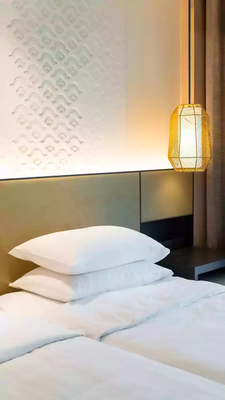 The Crisp Secret: Why Hotels Adorn Beds with Pristine White Linens