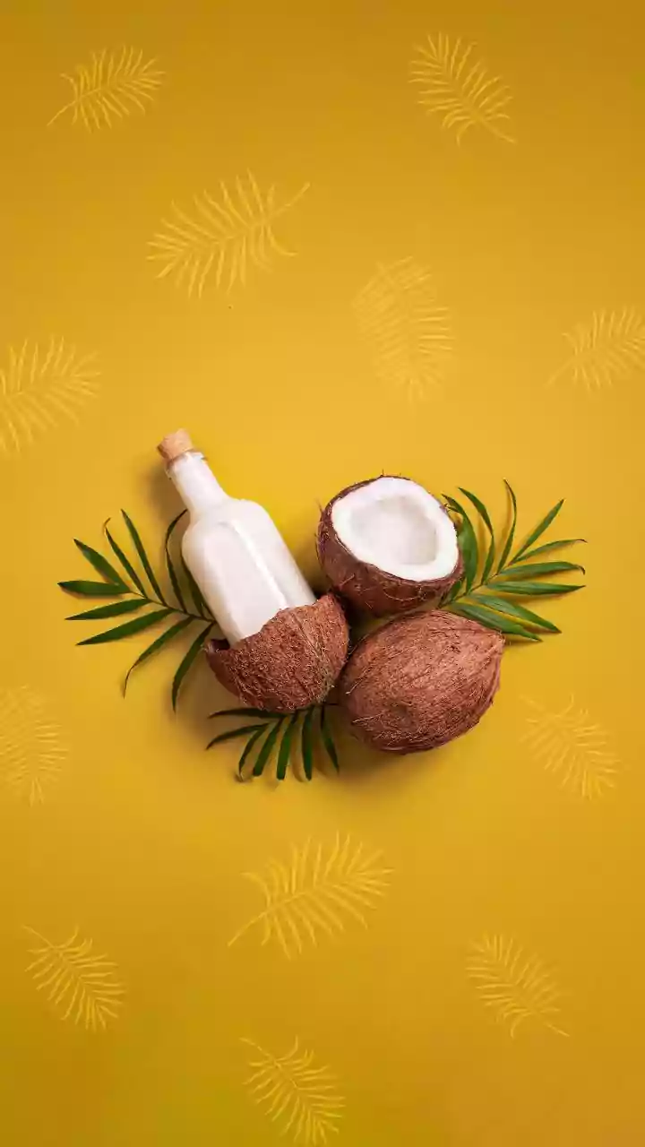 Summer Hair Care: Coconut Oil vs. Coconut Water for Growth & Health