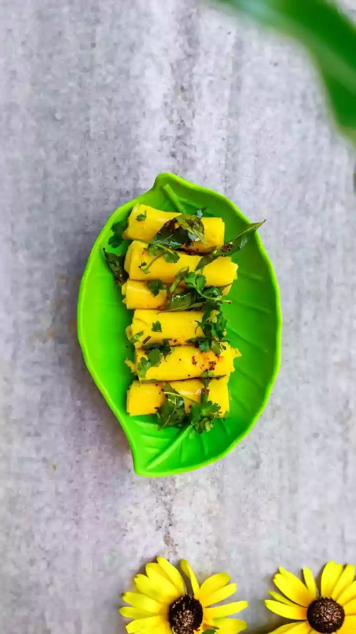 Khandvi vs. Laphing: A Tale of Two Rolled Snacks