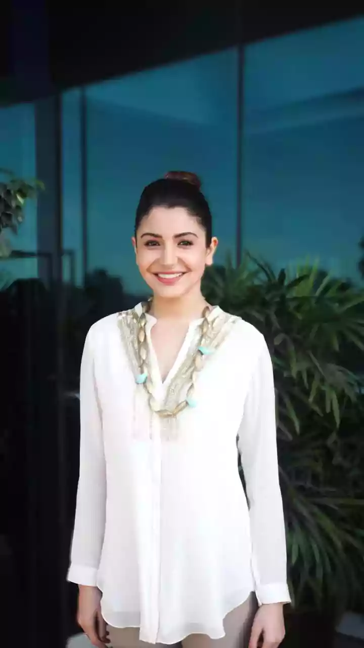 Delhi Airport Style: Anushka Sharma's Breezy Chic Meets Virat Kohli's Casual Cool