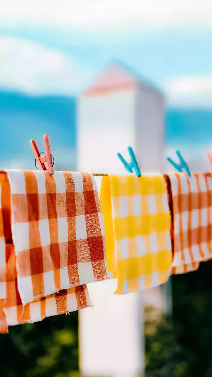 Why are new tea towels worse at drying dishes than older ones?
