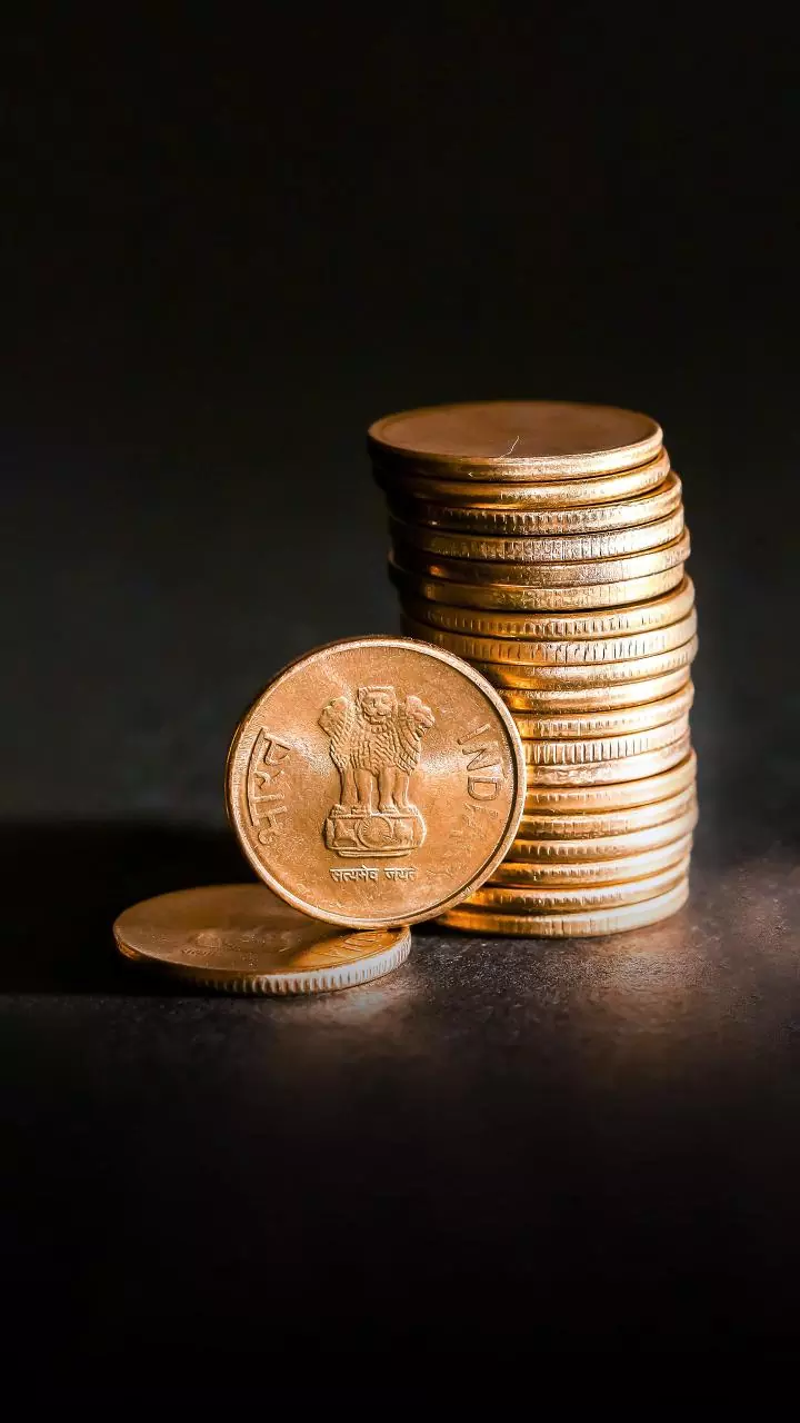 Rupee Gains Against US Dollar, Closes at 87.93