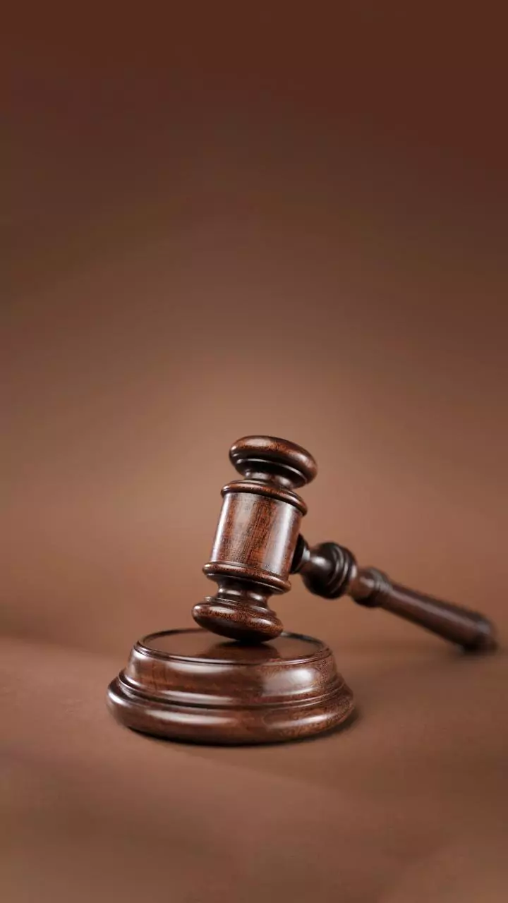 Murder accused killed while trying to flee by snatching pistol from police; two cops injured