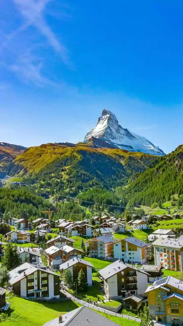 Exploring The Alps From The Air Offers Views Of Peaks And Mountain Valleys