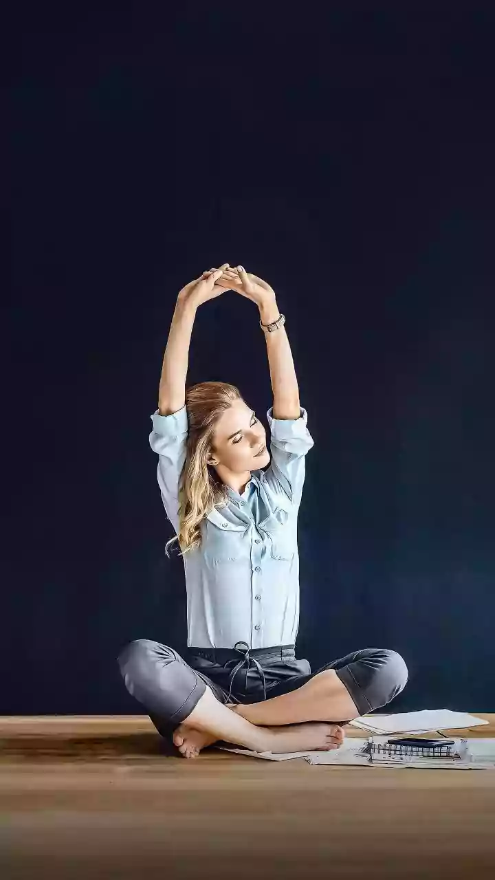 Relieve Work Stress With Mindful Afternoon Desk Yoga Stretches