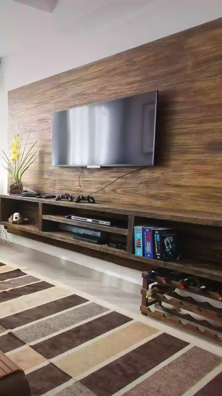 How Wall-Mounted TV Units Clear Up Usable Floor Space In Small Rental Apartment Living Rooms