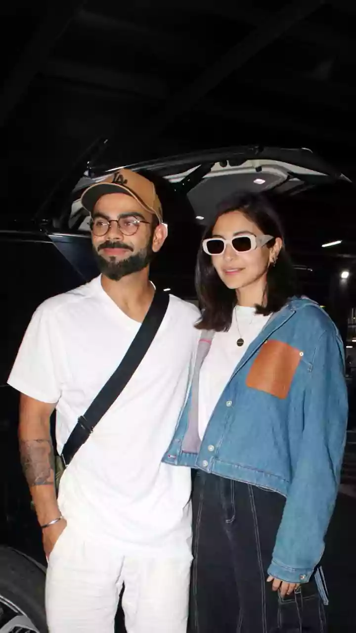 Anushka Sharma & Virat Kohli's Effortless Delhi Airport Style: A Fashionable Travel Guide