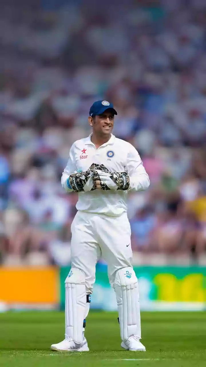 Why did Dhoni announce Test retirement in 2014?