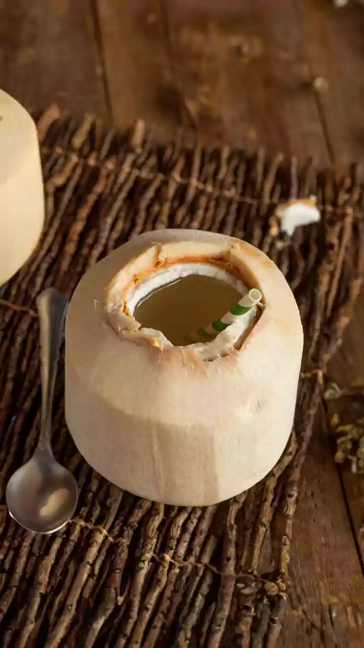 Mix coconut water rock salt and lemon to prepare natural workout sports drinks