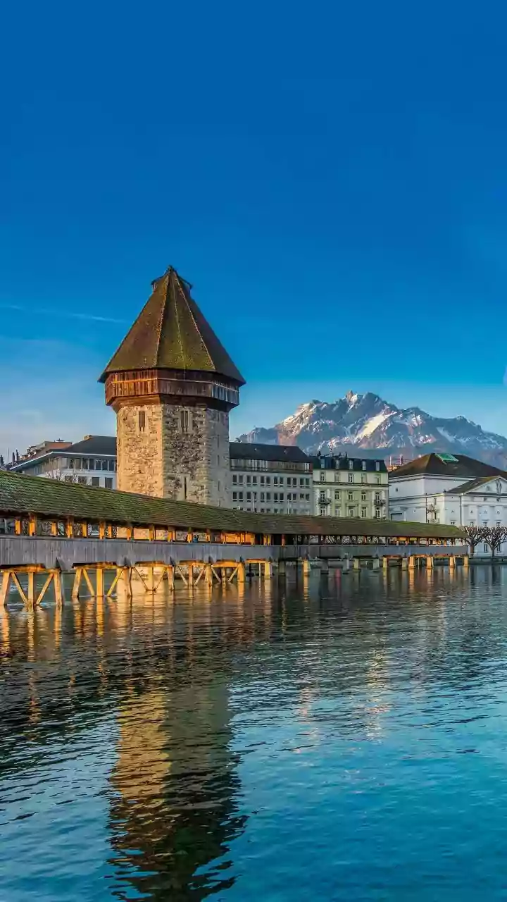 Swiss Alps Paragliding Can Include Tandem Flights For First-Time Visitors Across Alpine Valleys