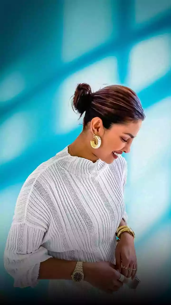 Matching Bobby Pins Keep the Low Bun Hardware Visually Seamless