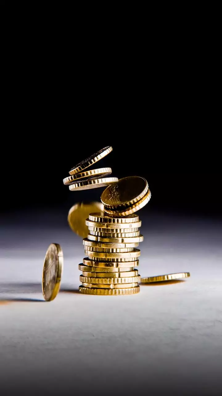 Gold futures trade volatile as strong US data, Fed remarks temper rate-cut hopes