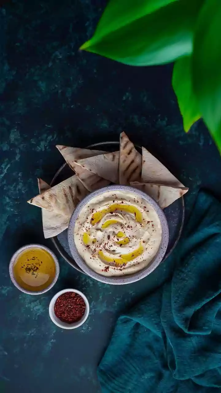 From Chickpeas To Tahini: How Extra Lemon Juice Elevates Homemade Hummus Dips