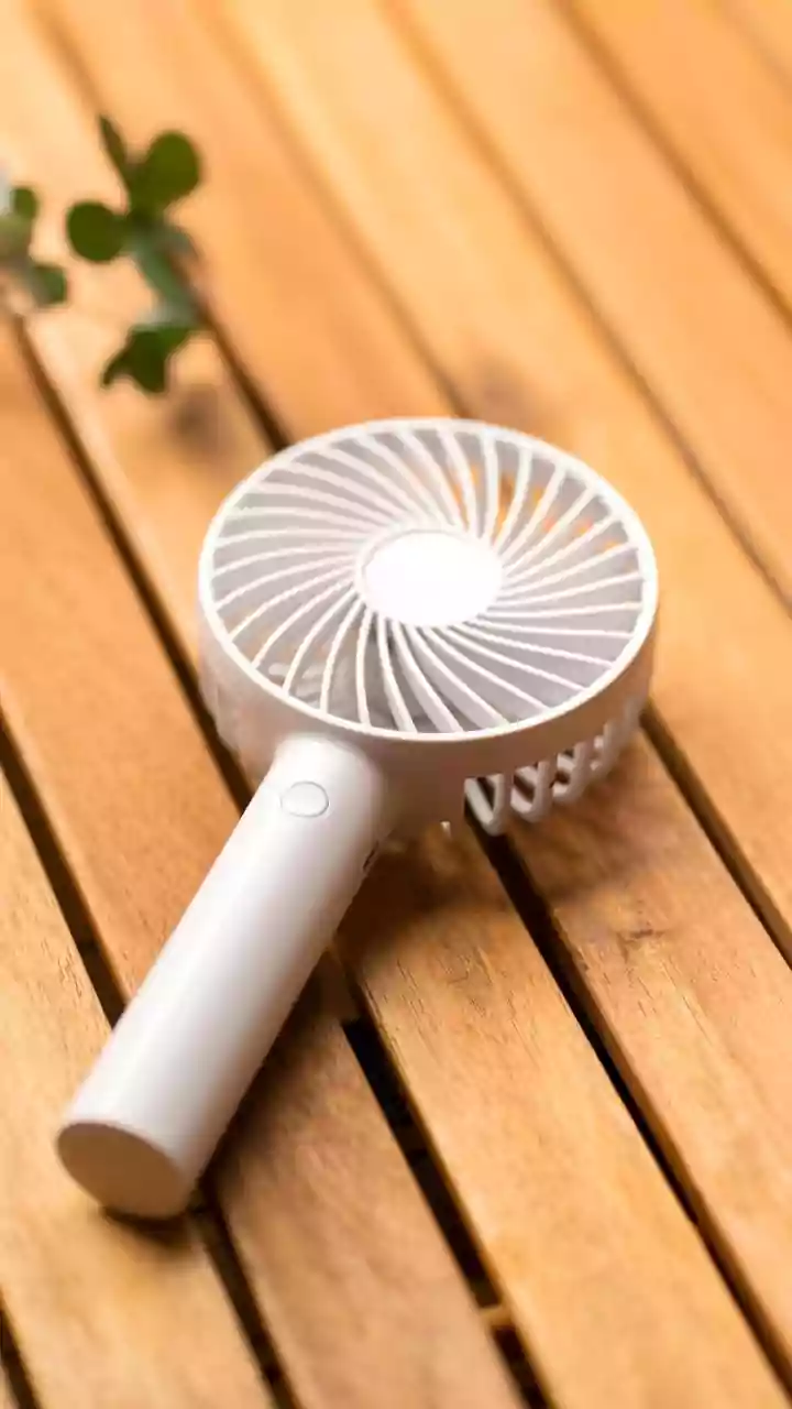 Stay Cool & Chic: Portable Fans are This Summer's Hottest Accessory!