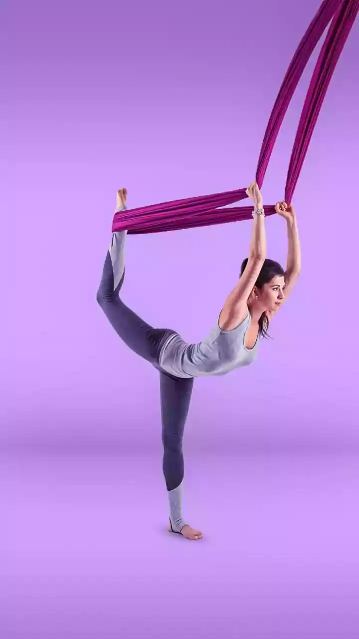 Soar to New Heights: Unveiling the Incredible Benefits of Aerial Yoga