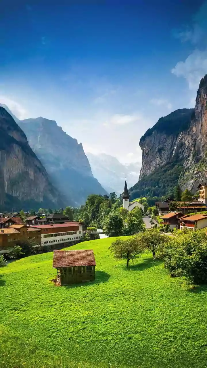 Across Alpine Valleys: Swiss Alps Paragliding Combines Aerial Sightseeing With Alpine Landscapes