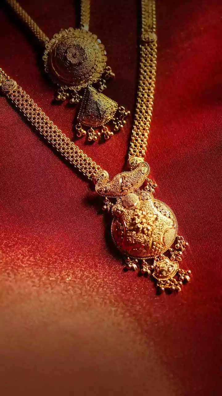 Gold, Silver Prices Ease On Profit Booking After Hitting Record Highs Amid Geopolitical & Fed Probe Concerns