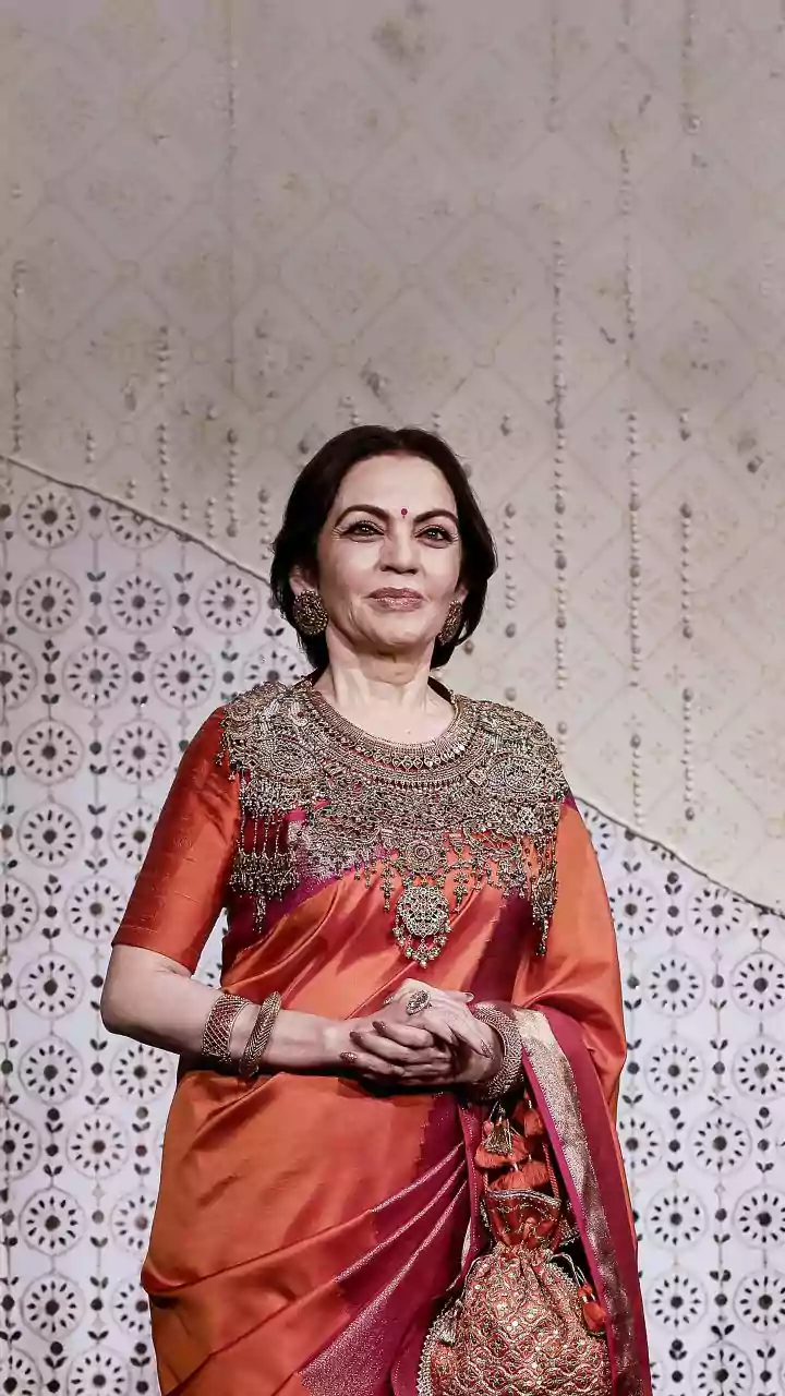 Nita Ambani, Radhika Merchant turn heads in red and orange at Antilia’s Ganesh Chaturthi celebrations