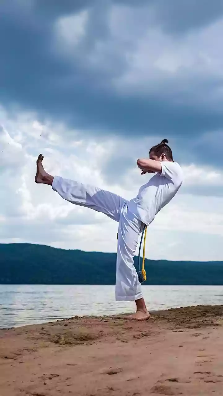 Tai Chi On Sand Adds A Balance Challenge To Slow, Controlled Movement