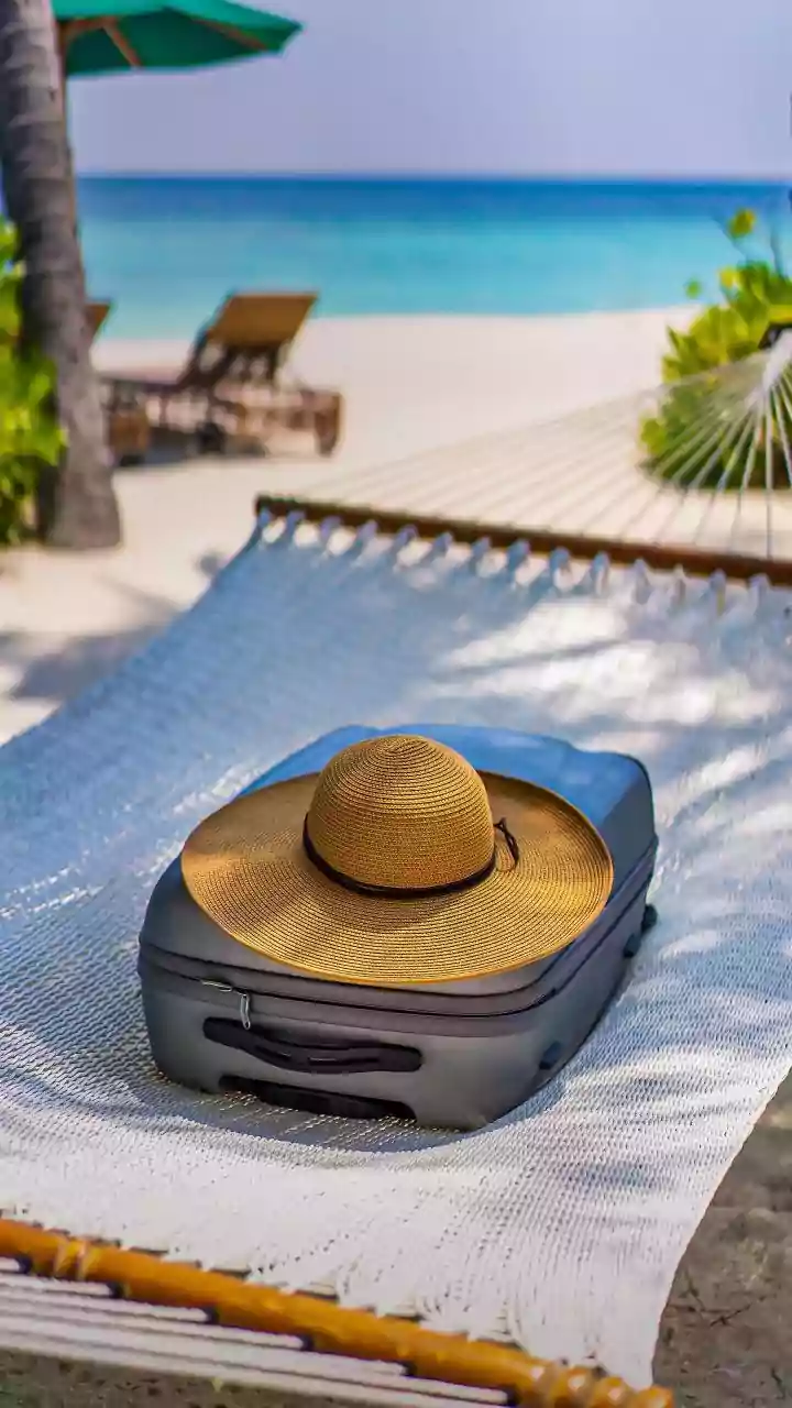Vacuum compression pouches compress bulky wardrobe items for humid beach weekend getaways