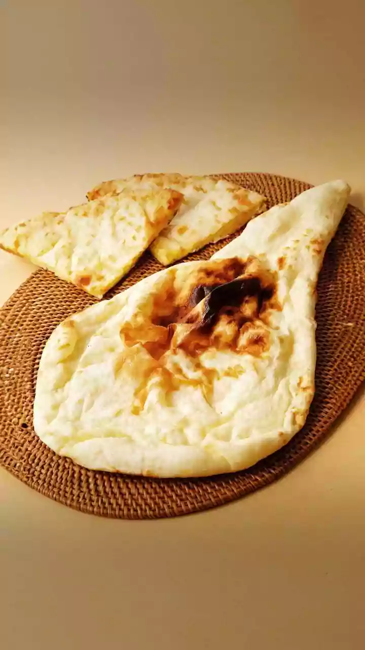Move Over Garlic Naan, Sourdough Naan Is the New Challenge
