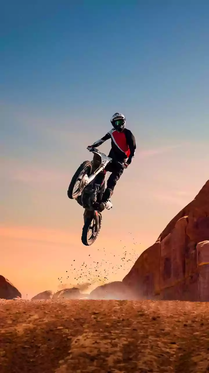 ‘In His Mind, He Is Dhoom’s Hero’: Internet Trolls Biker Trying To Drive UNDER A Speeding Truck | Viral Video