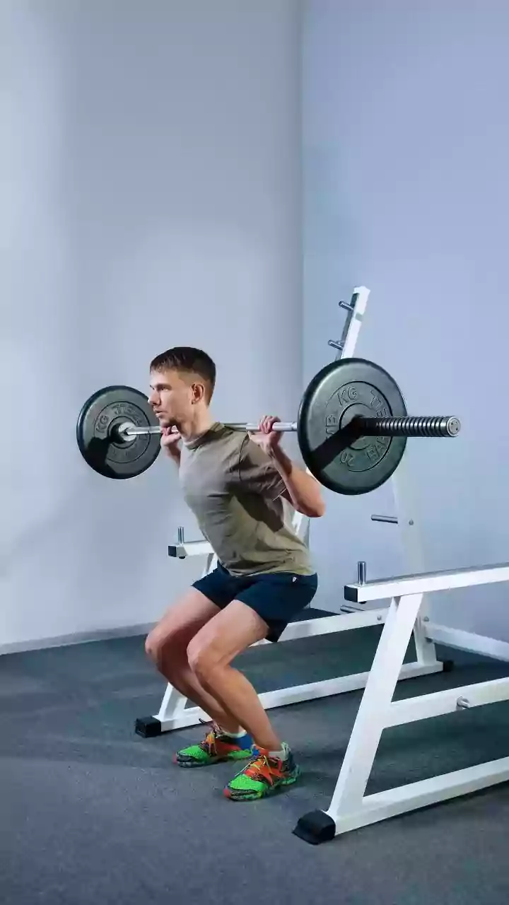 Unleash Leg Power: The Barbell-Between-Legs Squat