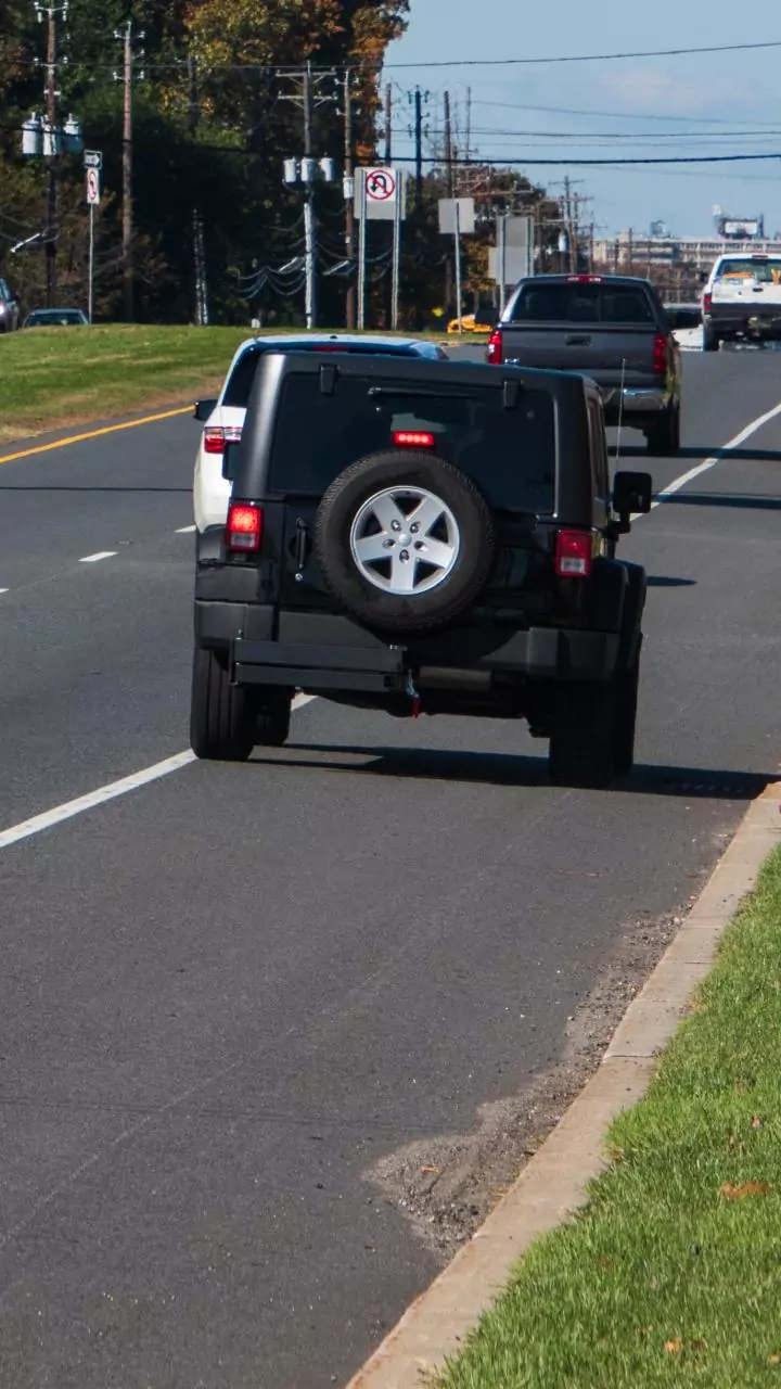 Self healing asphalt with bio engineered binders fixes city potholes after heavy rainfall