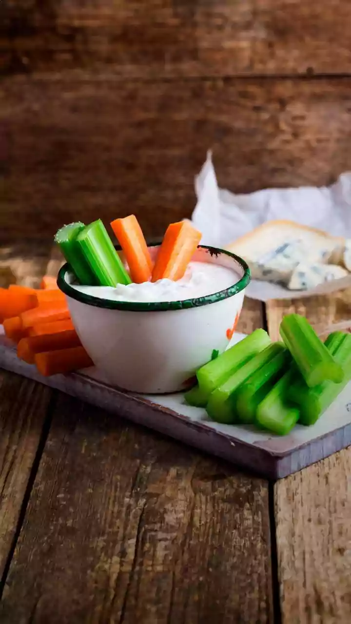 A Healthy Snack Guide For New Office Workers Pairs Hummus With Fresh Vegetable Sticks