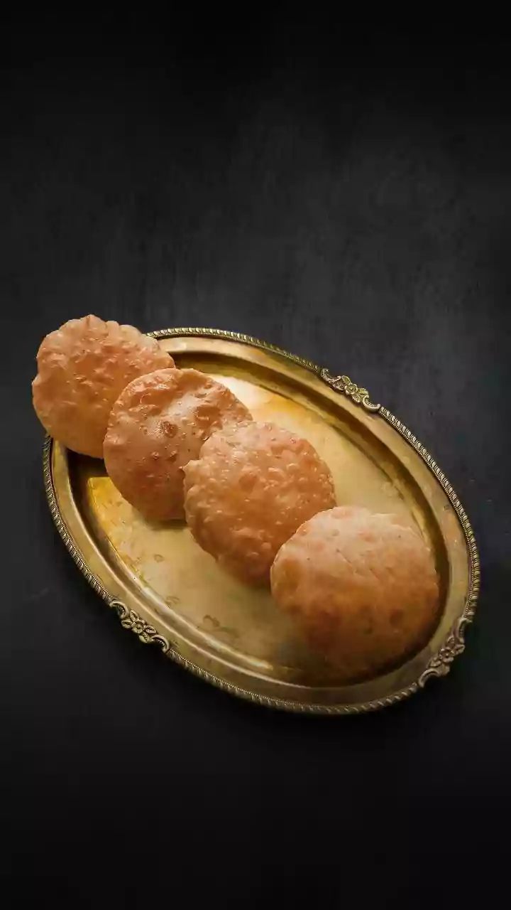 Overheated Oil Can Brown Pooris Before They Puff Properly