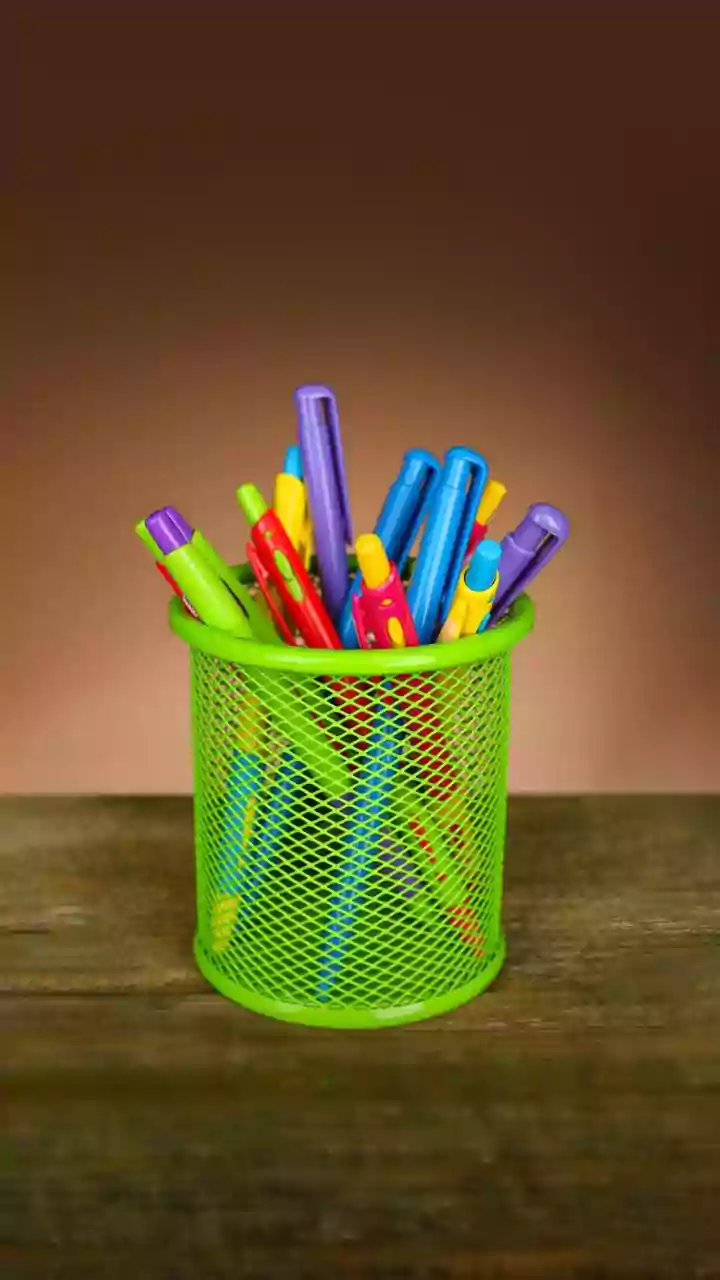 Turn old plastic containers into handy desk organizers